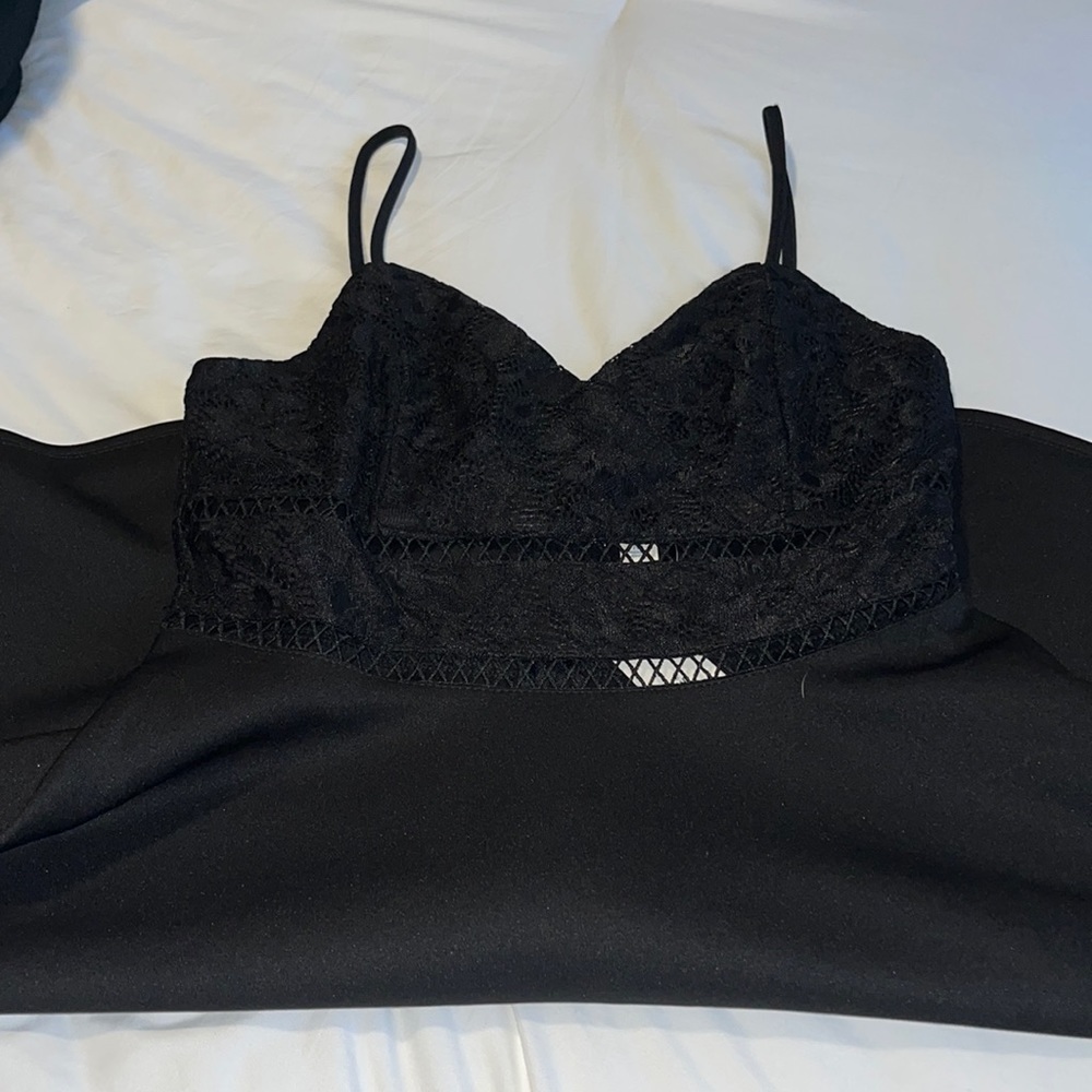 Francesca’s black dress with lace